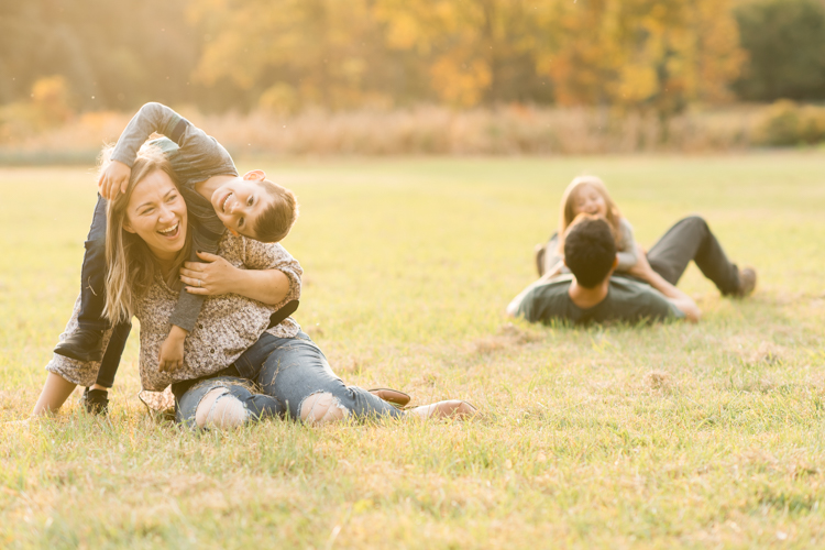 Fall is in full swing here in NJ, my first Fall Family session with Anna and Adam at their Farm House in Hackettstown NJ. Anna and Adam recently purchased their dream farm house on a 4 acres of land. This family of four now has chickens, ducks, birds, cats, a dog, sheep and plans to add many more to the list in the future. I had the honor of visiting Anna and Adam and their two beautiful children at their Farm the other day. I got much need vitamin D walking around the property, enjoying the foliage, running around with their kids and meeting all the farm animals. I sincerely enjoy photographing families now because there are no dull moments with kids, every moment is perfect! Fall family session at Anna and Adam’s Farm at Hackettstown NJ photographed by Karis from HeyKaris.